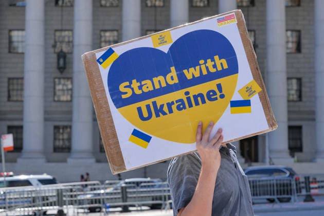 August 23, 2026, New York, New York, USA: Annual Ukrainian Independence March celebrating freedom from foreign domination. A large crowd .marched from Foley Square down Broadway to Bowling Green in Lower Manhattan commemorating .Ukraine freedom from Soviet Union oppression on Aujust 24. Carrying the blue and yellow flag of Ukraine as well as the US flag they carried the message of fighting back against Russia trying to continue their colonial empire. Ukraine is standing strong..Standing for democracy not tyranny. New York USA  - ZUMAh156 20260823_znp_h156_001 Copyright: xMiloxHessx