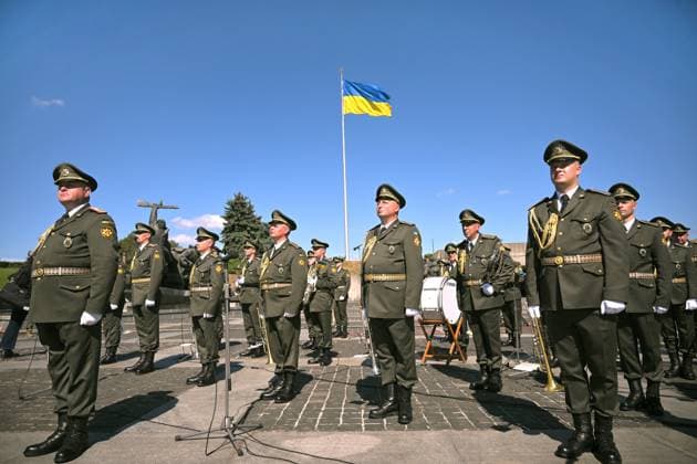 Musicians from a brass band participate in the ceremony to raise the State Flag at the National Museum of the History of Ukraine in the Second World War Memorial Complex on National Flag Day, Kyiv, Ukraine, August 23, 2026. (Photo by Yevhen Kotenko Ukrinform) Raising of State Flag of Ukraine in Kyiv  Copyright: xYevhenxKotenkox