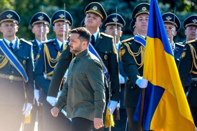 President of Ukraine Volodymyr Zelenskyy walks past honour guards during the raising of the State Flag at the National Museum of the History of Ukraine in the Second World War Memorial Complex on National Flag Day, Kyiv, Ukraine, August 23, 2026. (Photo by Yevhen Kotenko Ukrinform) Raising of State Flag of Ukraine in Kyiv  Copyright: xYevhenxKotenkox