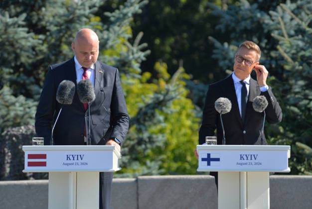Prime Minister of Latvia Andris Kulbergs (L) and President of Finland Alexander Stubb attend the State Flag raising ceremony at the National Museum of the History of Ukraine in the Second World War Memorial Complex on National Flag Day, Kyiv, Ukraine, August 23, 2026. (Photo by Yevhen Kotenko Ukrinform) Raising of State Flag of Ukraine in Kyiv  Copyright: xYevhenxKotenkox
