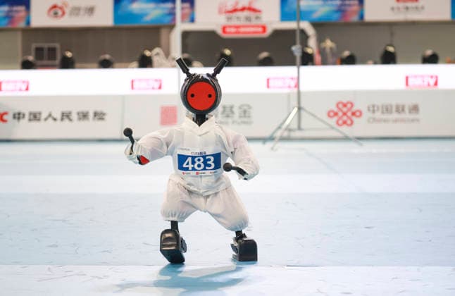BEIJING, CHINA - AUGUST 23:The robot of CUEB Zhizao competes during the Tai Chi event on day 2 of the 2nd World Humanoid Robot Games at National Speed Skating Oval on August 23, 2026 in Beijing, China.  Copyright: xChinaxNewsxServicex 111661704603