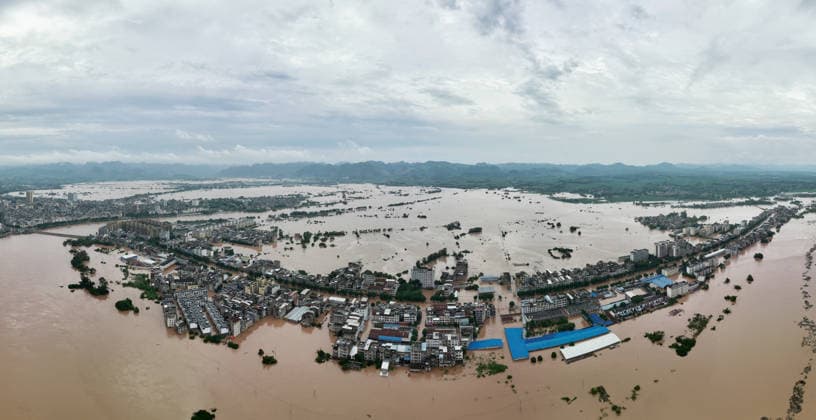 NINGMING, CHINA - AUGUST 23: Residents evacuate in an orderly manner as floods hit Chengzhong Town, Ningming County, Chongzhi City on August 23, 2026 in Ningming, Guangxi Zhuang Autonomous Region of China. The flooding was caused by a typhoon affecting the region.  Copyright: xVCGx 111661703324