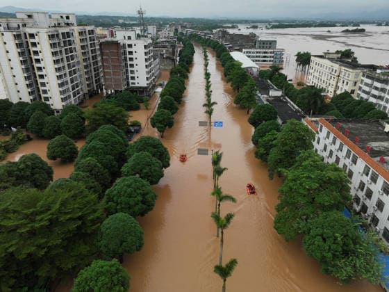 NINGMING, CHINA - AUGUST 23: Residents evacuate in an orderly manner as flooding hits Chengzhong Town of Ningming County due to a typhoon on August 23, 2026 in Ningming, Guangxi Zhuang Autonomous Region of China.  Copyright: xVCGx 111661703320