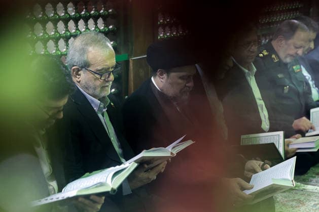 President Masoud Pezeshkian (L) attends an event to mark the first day of the Government Week at the mausoleum of Ayatollah Ruhollah Khomeini, the founder of the Islamic Republic of Iran, in Tehran, Iran on August 23, 2026. Iranian President Masoud Pezeshkian declared that no power will be able to force the Iranian people into surrender. He dismissed claims that sanctions would turn Iran into another Venezuela, saying that has not happened. He stressed the need to begin conserving gasoline consumption through government measures, including a plan to reduce the number and fuel use of government vehicles.  IRN2026082310 IranianxPresidency