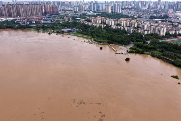 NANNING, CHINA - AUGUST 24: Aerial view of floodwaters submerging riverside park and walkway along the Yong River on August 24, 2026 in Nanning, Guangxi Zhuang Autonomous Region of China. Heavy rainfall brought by Typhoon Narra flooded the low-lying areas in south China s Guangxi Zhuang Autonomous Region.  Copyright: xVCGx 111661812022