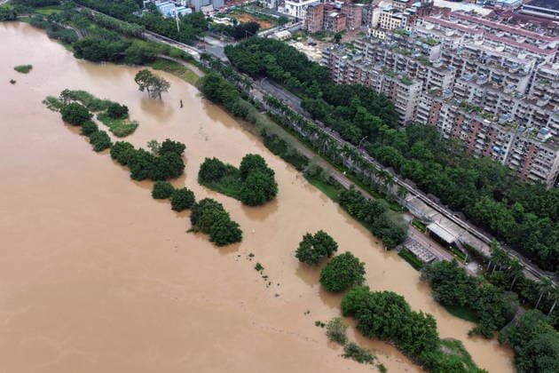 NANNING, CHINA - AUGUST 24: Aerial view of floodwaters submerging riverside park and walkway along the Yong River on August 24, 2026 in Nanning, Guangxi Zhuang Autonomous Region of China. Heavy rainfall brought by Typhoon Narra flooded the low-lying areas in south China s Guangxi Zhuang Autonomous Region.  Copyright: xVCGx 111661812023