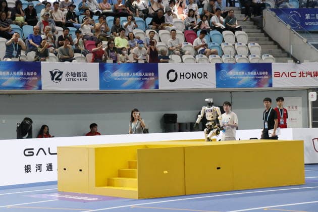 World Humanoid Robot Games in Beijing BEIJING, CHINA - AUGUST 24: Humanoid robots compete in 400-meter hurdles race within the second edition of World Humanoid Robot Games in Beijing, China on August 24, 2026. Emre Aytekin Anadolu Beijing China. Editorial use only. Please get in touch for any other usage.  Copyright: x2026xAnadoluxEmrexAytekinx
