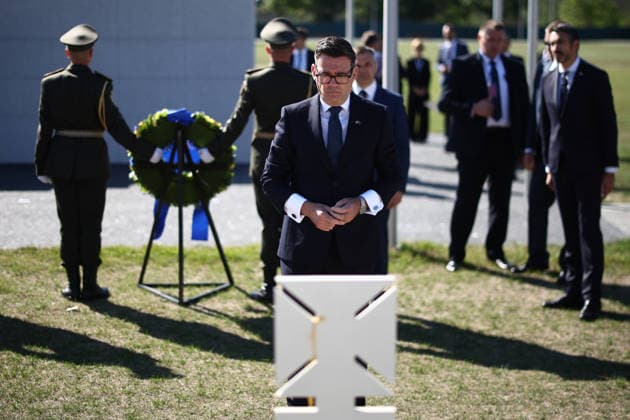 British PM Andy Burnham visits Ukraine Britain s prime minister Andy Burnham collects his thoughts after laying a wreath of flowers during a ceremony at Ukraine s national military memorial cemetery in Hatne, southwest of Kyiv on August 24, 2026. Ukraine hosts a meeting of its key European backers on August 24 to press for critical air-defence supplies and more pressure on Moscow, with Russian attacks killing more civilians than at any time since the first months of the invasion., Credit:HENRY NICHOLLS PA ROTA - B68 Avalon Ukraine, Hatne  Copyright: xHENRYxNICHOLLSx xPAxROTAx-xB68x xAvalonx 1128172009