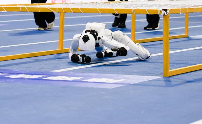 (260824) -- BEIJING, Aug. 24, 2026 -- The robot of Tianxiao Team competes during 400m Obstacles of the 2nd World Humanoid Robot Games in Beijing, capital of China, Aug. 24, 2026. ) (SP)CHINA-BEIJING-WORLD HUMANOID ROBOT GAMES (CN) XuxYanan 