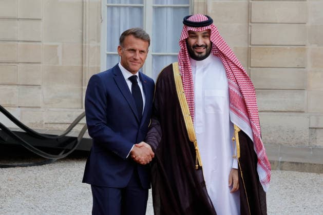 (260824) -- PARIS, Aug. 24, 2026 -- French President Emmanuel Macron (L) welcomes Saudi Crown Prince and Prime Minister Mohammed bin Salman bin Abdulaziz Al Saud at Elysee Palace, in Paris, France, Aug. 24, 2026. (Photo by Xinhua) FRANCE-PARIS-MACRON-SAUDI CROWN PRINCE-MEETING HenrixSzwarc 
