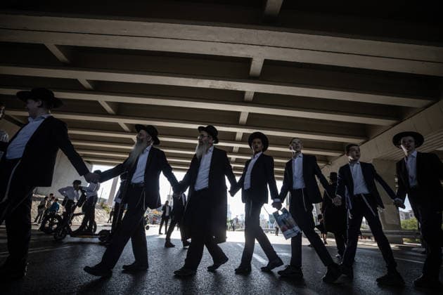 Haredi Jews protest mandatory military service in Bnei Brak BNEI BRAK, ISRAEL - AUGUST 24: Ultra-Orthodox Jews, known as Haredim, gather to protest mandatory military service, blocking one of the city s main roads in Bnei Brak near Tel Aviv, Israel on August 24, 2026. The protesters, wearing traditional black suits, white shirts and black hats, demonstrate against a government bill that proposes fines and other sanctions for those refusing military service. Mostafa Alkharouf Anadolu Bnei Brak Israel. Editorial use only. Please get in touch for any other usage.  Copyright: x2026xAnadoluxMostafaxAlkharoufx