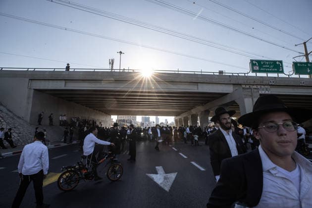 Haredi Jews protest mandatory military service in Bnei Brak BNEI BRAK, ISRAEL - AUGUST 24: Ultra-Orthodox Jews, known as Haredim, gather to protest mandatory military service, blocking one of the city s main roads in Bnei Brak near Tel Aviv, Israel on August 24, 2026. The protesters, wearing traditional black suits, white shirts and black hats, demonstrate against a government bill that proposes fines and other sanctions for those refusing military service. Mostafa Alkharouf Anadolu Bnei Brak Israel. Editorial use only. Please get in touch for any other usage.  Copyright: x2026xAnadoluxMostafaxAlkharoufx