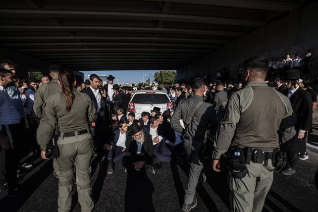Haredi Jews protest mandatory military service in Bnei Brak BNEI BRAK, ISRAEL - AUGUST 24: Ultra-Orthodox Jews, known as Haredim, gather to protest mandatory military service, blocking one of the city s main roads in Bnei Brak near Tel Aviv, Israel on August 24, 2026. The protesters, wearing traditional black suits, white shirts and black hats, demonstrate against a government bill that proposes fines and other sanctions for those refusing military service. Mostafa Alkharouf Anadolu Bnei Brak Israel. Editorial use only. Please get in touch for any other usage.  Copyright: x2026xAnadoluxMostafaxAlkharoufx