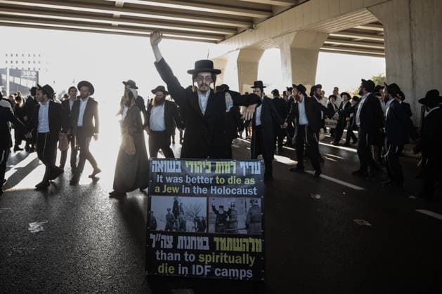 Haredi Jews protest mandatory military service in Bnei Brak BNEI BRAK, ISRAEL - AUGUST 24: Ultra-Orthodox Jews, known as Haredim, gather to protest mandatory military service, blocking one of the city s main roads in Bnei Brak near Tel Aviv, Israel on August 24, 2026. The protesters, wearing traditional black suits, white shirts and black hats, demonstrate against a government bill that proposes fines and other sanctions for those refusing military service. Mostafa Alkharouf Anadolu Bnei Brak Israel. Editorial use only. Please get in touch for any other usage.  Copyright: x2026xAnadoluxMostafaxAlkharoufx