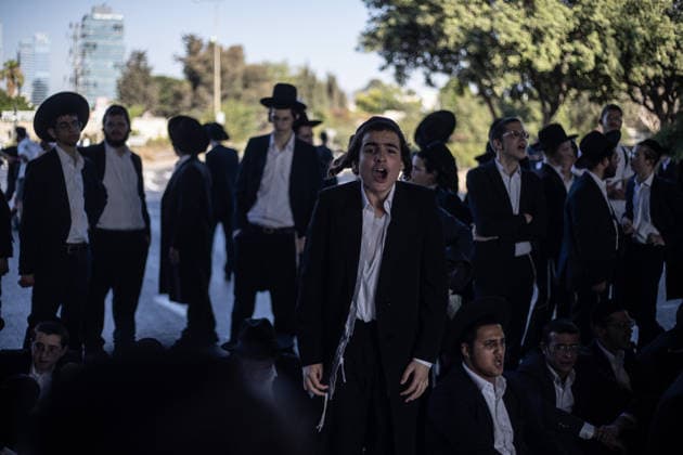 Haredi Jews protest mandatory military service in Bnei Brak BNEI BRAK, ISRAEL - AUGUST 24: Ultra-Orthodox Jews, known as Haredim, gather to protest mandatory military service, blocking one of the city s main roads in Bnei Brak near Tel Aviv, Israel on August 24, 2026. The protesters, wearing traditional black suits, white shirts and black hats, demonstrate against a government bill that proposes fines and other sanctions for those refusing military service. Mostafa Alkharouf Anadolu Bnei Brak Israel. Editorial use only. Please get in touch for any other usage.  Copyright: x2026xAnadoluxMostafaxAlkharoufx