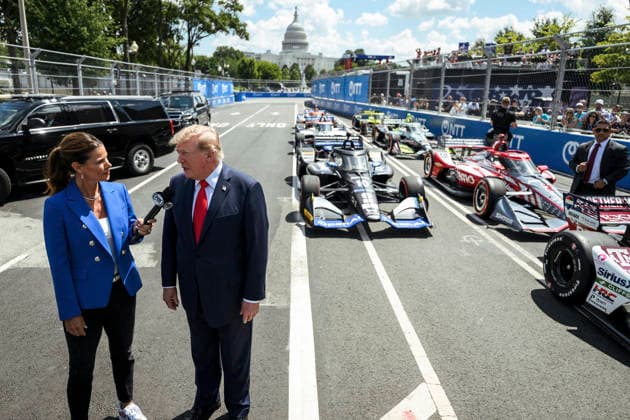 August 24, 2026, Washington, Dc, United States: U.S. President Donald Trump, is interviewed by Fox Sports Commentator Jamie Little, left, before the start of the Freedom 250 Grand Prix Race, August 23, 2026 in Washington, D.C. Washington United States - ZUMAp138 20260824_zaa_p138_022 Copyright: xDanielxTorok WhitexHousex