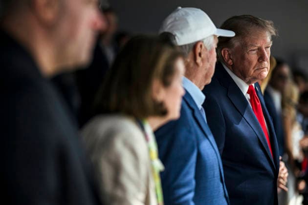 August 24, 2026, Washington, Dc, United States: U.S. President Donald Trump, right, stands with Roger Penske, owner of the Penske Motorsports, center, before the start of the Freedom 250 Grand Prix Race, August 23, 2026 in Washington, D.C. Washington United States - ZUMAp138 20260824_zaa_p138_029 Copyright: xDanielxTorok WhitexHousex