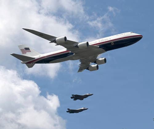 August 24, 2026, Washington, Dc, United States: U.S. Air Force F-35 stealth fighter aircraft flank Air Force One during a fly-over past the U.S Capitol Building before the start of the Freedom 250 Grand Prix Race, August 23, 2026 in Washington, D.C. Washington United States - ZUMAp138 20260824_zaa_p138_045 Copyright: xAndyxMorataya Usafx
