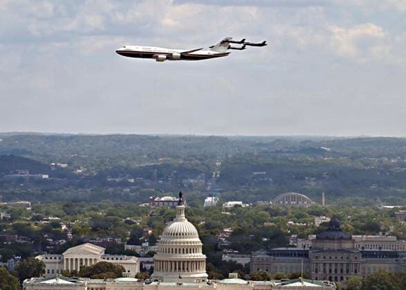 August 24, 2026, Washington, Dc, United States: U.S. Air Force F-35 stealth fighter aircraft flank Air Force One during a fly-over past the U.S Capitol Building before the start of the Freedom 250 Grand Prix Race, August 23, 2026 in Washington, D.C. Washington United States - ZUMAp138 20260824_zaa_p138_049 Copyright: xUsxAirxForce Usafx