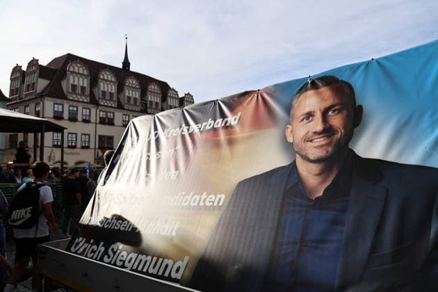 Wahlkampf der AfD zur Landtagswahl in Sachsen-Anhalt 24.08.2026, Naumburg, Wahlkampf der AfD auf dem Naumburger Marktplatz, am 06.09.2026 wird der neue Landtag in Sachsen-Anhalt gewaehlt im Bild: Wahlplakat von Spitzenkandidat Ulrich Siegmund (AfD) auf dem Marktplatz *** AfD campaign for the state legislative election in Saxony-Anhalt on August 24, 2026, Naumburg, AfD campaign rally on Naumburg’s market square; on September 6, 2026, the new state parliament of Saxony-Anhalt will be elected. Pictured: Campaign poster of AfD lead candidate Ulrich Siegmund on the market square