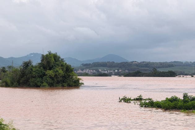 NANNING, CHINA - AUGUST 24: Floodwaters submerge roads and fields due to continuous heavy rainfall brought by Typhoon Narra on August 24, 2026 in Ningming County, Guangxi Zhuang Autonomous Region of China. Heavy rainfall brought by Typhoon Narra flooded the low-lying areas in south China s Guangxi Zhuang Autonomous Region.  Copyright: xChinaxNewsxServicex 111661873655