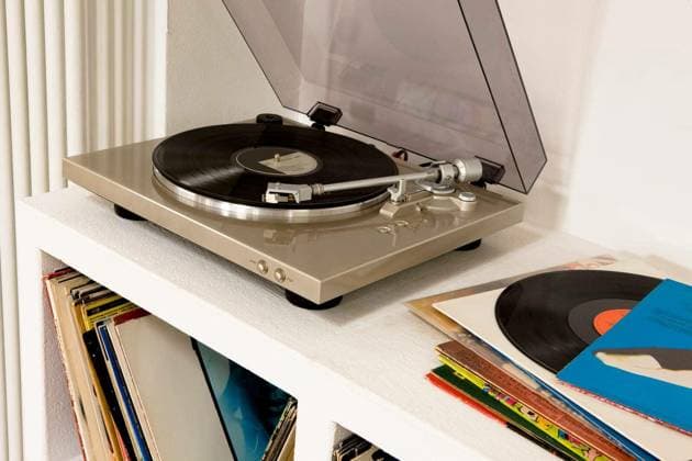 Closeup of a gramophone over shelf with vinyl records model released Symbolfoto Copyright: xmoodboardx Panthermedia75412784.jpg