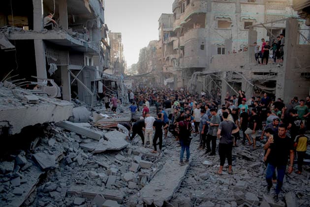 Israeli Strikes Beach Camp Gaza City A crowd of Palestinians gathers in a street filled with rubble near the Asqalan prayer hall in Gaza City, Gaza Strip, on August 24, 2026. Israeli warplanes struck the site following an evacuation warning to residents, completely destroying the Asqalan Prayer Hall and reportedly damaging nearby buildings. Gaza Gaza Strip Palestine Territories Copyright: xMohammedxMxSkaikx