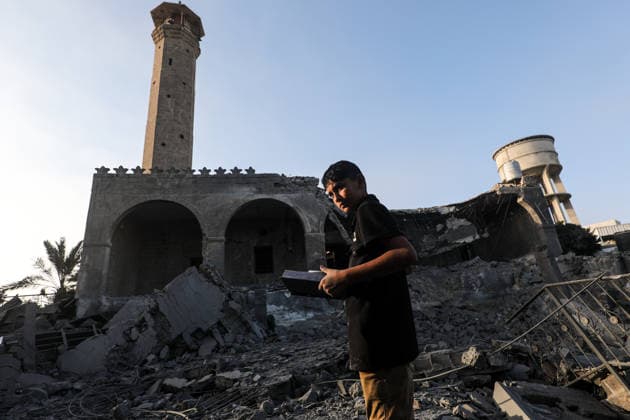 Abu Salim Mosque severely damaged in Israeli airstrike in Deir al-Balah DEIR AL-BALAH, GAZA, PALESTINE - AUGUST 25: A young Palestinian is seen among the rubble of the heavily damaged Abu Salim Mosque and surrounding neighborhood following an Israeli airstrike carried out despite the ceasefire in Deir al-Balah, in the central Gaza Strip, Palestine on August 25, 2026. The strike caused widespread collapse, reduced parts of the religious building to rubble, and damaged nearby residential structures and streets across the area. Moiz Salhi Anadolu Deir al-Balah Gaza. Editorial use only. Please get in touch for any other usage.  Copyright: x2026xAnadoluxMoizxSalhix