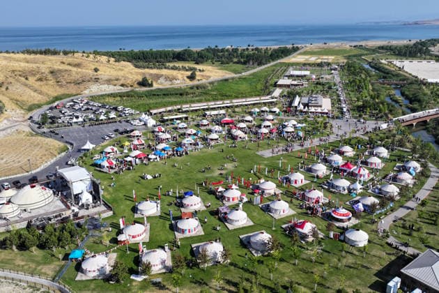 955th Anniversary of Malazgirt Victory in Bitlis, Turkiye BITLIS, TURKIYE - AUGUST 25: An aerial view shows crowds and traditional tents at Recep Tayyip Erdogan Ahlat National Garden during events marking the 955th anniversary of the Malazgirt Victory (Battle of Manzikert), on August 25, 2026 in Ahlat, Bitlis, Turkiye. The celebrations, held in the Carho area and centered around the Sultan Alparslan encampment, continued for a third day and drew residents as well as visitors from across the country. The 1071 Battle of Manzikert is widely regarded as a major turning point in Anatolian history, accelerating Turkic settlement in the region following the Seljuk victory over the Byzantine Empire. Ozkan Bilgin Anadolu Bitlis Turkey. Editorial u  Copyright: x2026xAnadoluxOzkanxBilginx