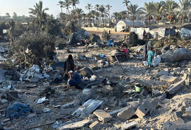 Palestinians Inspect Damage After Israeli Strike in Deir el-Balah Palestinians inspect destruction caused by an Israeli strike that hit residents’ homes, displacement tents and a food aid warehouse in Deir el-Balah, in the central Gaza Strip, on August 25, 2026. The strike took place the previous evening after an Israeli warning ordering residents to evacuate the area. Photo by Ahmed Ibrahim apaimages Deir al-Balah Gaza Palestinian Territory 250826_Deir_al-Balah_AI_00(6) Copyright: xapaimagesxAhmedxIbrahimx xapaimagesx