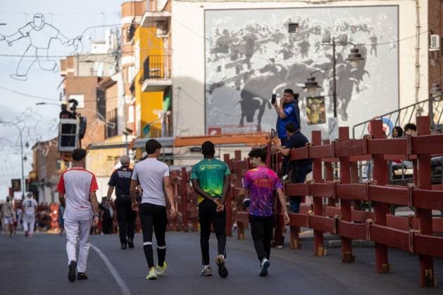 August 25, 2026, Madrid, Spain: Four runners walk along a street before the start of the first bull run of the San SebastioÂ¡n de los Reyes Festival..First bull run of the San Sebastian de los Reyes festivities, a town located north of Madrid, with bulls from the Hermanos Tardeu ranch. The San Sebastian de los Reyes festivities, also known as the Sanse Festival or Little Pamplona, are celebrated in honor of the Holy Christ of the Remedies and take place every year during the last week of August. Madrid Spain - ZUMAs197 20260825_aaa_s197_009 Copyright: xDavidxCanalesx