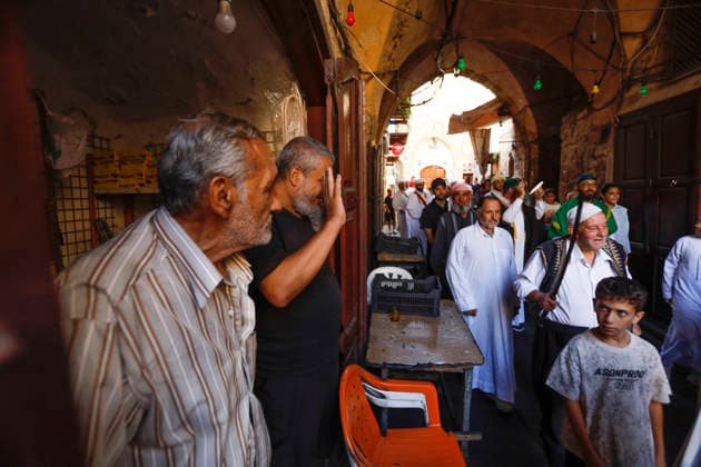 August 25, 2026, Saida, Saidon District, lebanon: Sufi devotees take part in a procession marking the birthday of Prophet Muhammad in the old city of Sidon, Lebanon. The procession began outside the RifaÃ¢â‚¬â ¢i Sufi lodge and moved through the historic streets accompanied by drums, chanting, swords and shields. Some devotees performed the traditional Ã¢â‚¬oeShishÃ¢â‚¬Â ritual, associated with certain RifaÃ¢â‚¬â ¢i Sufi communities, involving the piercing of the body with metal skewers during intense religious chanting. Residents distributed sweets and sprayed rose water as the procession passed. Saida lebanon - ZUMAb339 20260825_znp_b339_010 Copyright: xAbdulxKaderxAlxBayx