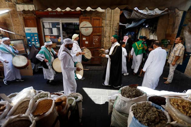 August 25, 2026, Saida, Saidon District, lebanon: Sufi devotees take part in a procession marking the birthday of Prophet Muhammad in the old city of Sidon, Lebanon. The procession began outside the RifaÃ¢â‚¬â ¢i Sufi lodge and moved through the historic streets accompanied by drums, chanting, swords and shields. Some devotees performed the traditional Ã¢â‚¬oeShishÃ¢â‚¬Â ritual, associated with certain RifaÃ¢â‚¬â ¢i Sufi communities, involving the piercing of the body with metal skewers during intense religious chanting. Residents distributed sweets and sprayed rose water as the procession passed. Saida lebanon - ZUMAb339 20260825_znp_b339_013 Copyright: xAbdulxKaderxAlxBayx