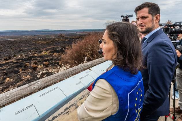 Walloon Minister President Adrien Dolimont and EU Commissioner for Equality, Preparedness and Crisis Management Hadja Lahbib pictured at a visit at the Botrange panorama deck, in Waimes, on Tuesday 25 August 2026. European commissionner Lahbib visit several sites regarding the fire in the Hautes Fagnes (Hugh Fens) wich started on August 14th with 3000 hectares (on a total of 4500) impacted in the nature reserve.  EMILExWINDAL 184244601