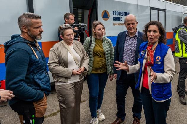 Local people and EU Commissioner for Equality, Preparedness and Crisis Management Hadja Lahbib pictured at a visit at PC-OPS coordination center in Sourbrodt, Waimes, on Tuesday 25 August 2026. European commissionner Lahbib visit several sites regarding the fire in the Hautes Fagnes (Hugh Fens) wich started on August 14th with 3000 hectares (on a total of 4500) impacted in the nature reserve.  EMILExWINDAL 184244674