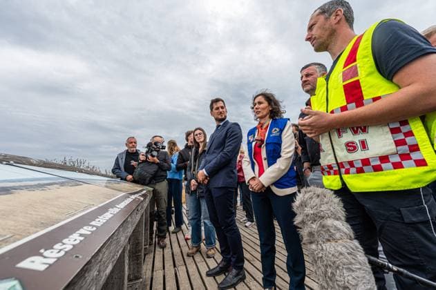 Walloon Minister President Adrien Dolimont and EU Commissioner for Equality, Preparedness and Crisis Management Hadja Lahbib pictured at a visit at the Botrange panorama deck, in Waimes, on Tuesday 25 August 2026. European commissionner Lahbib visit several sites regarding the fire in the Hautes Fagnes (Hugh Fens) wich started on August 14th with 3000 hectares (on a total of 4500) impacted in the nature reserve.  EMILExWINDAL 184245081