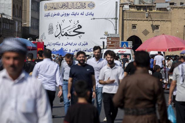 Iraqis gather in Erbil to mark Mawlid al-Nabi ERBIL, IRAQ - AUGUST 25: People gather in decorated streets and shop at the historic Qaysari Bazaar near the Erbil Citadel during Mawlid al-Nabi celebrations in Erbil, Iraq, on August 25, 2026. Marking the birth anniversary of Prophet Muhammad, streets and public squares across the city were adorned with lights and banners as residents and visitors visited local markets to shop and buy traditional sweets. Ahsan Mohammed Ahmed Ahmed Anadolu Erbil Iraq. Editorial use only. Please get in touch for any other usage.  Copyright: x2026xAnadoluxAhsanxMohammedxAhmedxAhmedx