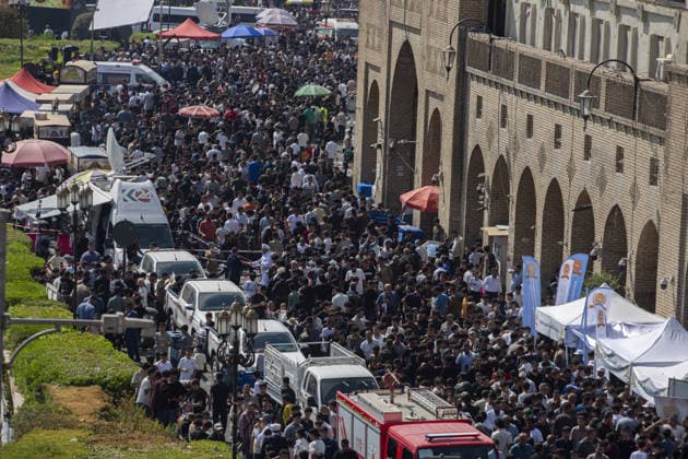 Iraqis gather in Erbil to mark Mawlid al-Nabi ERBIL, IRAQ - AUGUST 25: People gather in decorated streets and shop at the historic Qaysari Bazaar near the Erbil Citadel during Mawlid al-Nabi celebrations in Erbil, Iraq, on August 25, 2026. Marking the birth anniversary of Prophet Muhammad, streets and public squares across the city were adorned with lights and banners as residents and visitors visited local markets to shop and buy traditional sweets. Ahsan Mohammed Ahmed Ahmed Anadolu Erbil Iraq. Editorial use only. Please get in touch for any other usage.  Copyright: x2026xAnadoluxAhsanxMohammedxAhmedxAhmedx