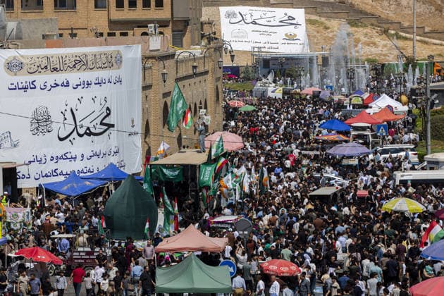 Iraqis gather in Erbil to mark Mawlid al-Nabi ERBIL, IRAQ - AUGUST 25: People gather in decorated streets and shop at the historic Qaysari Bazaar near the Erbil Citadel during Mawlid al-Nabi celebrations in Erbil, Iraq, on August 25, 2026. Marking the birth anniversary of Prophet Muhammad, streets and public squares across the city were adorned with lights and banners as residents and visitors visited local markets to shop and buy traditional sweets. Ahsan Mohammed Ahmed Ahmed Anadolu Erbil Iraq. Editorial use only. Please get in touch for any other usage.  Copyright: x2026xAnadoluxAhsanxMohammedxAhmedxAhmedx