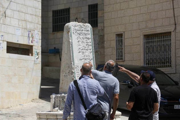 Far-right Israeli lawmaker smashes Palestinian memorial in West Bank NABLUS, WEST BANK, PALESTINE - AUGUST 25: Palestinians inspect the damage to a Palestinian memorial, which was smashed with a sledgehammer by far-right Israeli lawmaker Zvi Sukkot and those accompanying him, who entered the village of Madama near Nablus in the northern West Bank under the protection of Israeli soldiers, on August 25, 2026. Far-right lawmaker Sukkot and those accompanying him raided the village of Madama in Nablus in the early morning under the protection of Israeli soldiers. Far-right Israeli lawmaker Zvi Sukkot along with three people accompanying him, smashed the memorial with sledgehammers and also recorded the others attacking the memorial with his pho  Copyright: x2026xAnadoluxNedalxEshtayahx