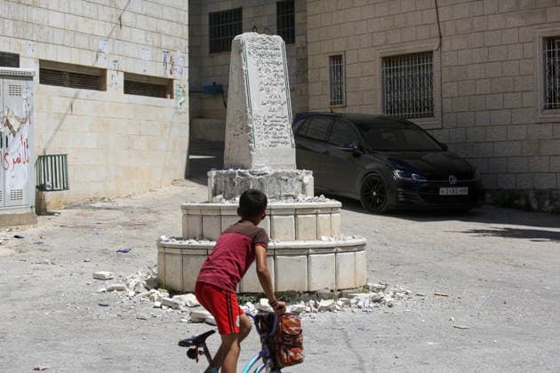Far-right Israeli lawmaker smashes Palestinian memorial in West Bank NABLUS, WEST BANK, PALESTINE - AUGUST 25: Palestinians inspect the damage to a Palestinian memorial, which was smashed with a sledgehammer by far-right Israeli lawmaker Zvi Sukkot and those accompanying him, who entered the village of Madama near Nablus in the northern West Bank under the protection of Israeli soldiers, on August 25, 2026. Far-right lawmaker Sukkot and those accompanying him raided the village of Madama in Nablus in the early morning under the protection of Israeli soldiers. Far-right Israeli lawmaker Zvi Sukkot along with three people accompanying him, smashed the memorial with sledgehammers and also recorded the others attacking the memorial with his pho  Copyright: x2026xAnadoluxNedalxEshtayahx