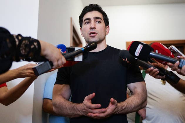 ARMENIA, YEREVAN - AUGUST 25, 2026: Levon Kocharyan, a member of the Armenia faction (Alliance Armenia) in the National Assembly of Armenia and son of former Armenian President Robert Kocharyan (1998-2008) talks to the media outside his apartment. The Armenian Anti-Corruption Committee accuses Robert Kocharyan of using his official position to acquire property at a price below its market value. Alexander Patrin TASS  96625094