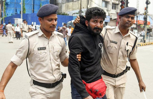 Students stage a protest demanding cancellation of the 70th BPSC examination Patna, Aug 25 (ANI): Police detain a student during a march towards Raj Bhavan from Gandhi Maidan, demanding cancellation of the 70th BPSC examination, in Patna on Tuesday. Patna Bihar India Copyright: xANIx ANI_20260825259