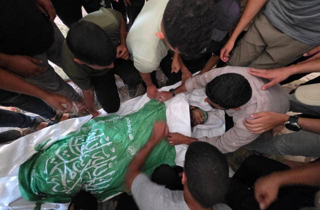 Palestinians Bury Three People in Khan Younis Palestinians attend the funeral of three people in Khan Younis, in the southern Gaza Strip, on August 25, 2026. Two died from wounds sustained in previous Israeli strikes, while the third was killed in an Israeli strike the previous evening. Photo by Tariq Mohammad APA Images Khan Yunis Gaza Strip Palestinian Territory 250826_Khan_Yunis_TM_04(3) Copyright: xapaimagesxTariqxMohammad xapaimagesx