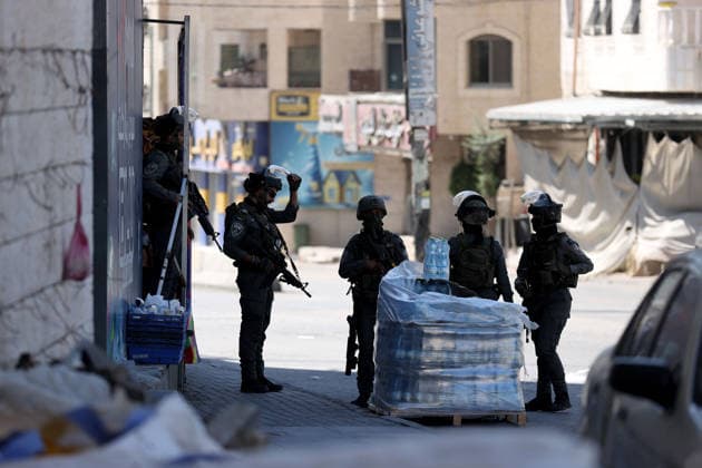 Israeli forces raid UNRWA s Kalendiya Education Center in East Jerusalem JERUSALEM - AUGUST 25 : Israeli forces raid the Qalandia Training Center belonging to the United Nations Relief and Works Agency for Palestine Refugees in the Near East (UNRWA) north of East Jerusalem on August 25, 2026. Israeli forces arrive to evacuate the center block surrounding streets and prevent local residents from approaching. Issam Rimawi Anadolu Jerusalem Palestinian Territory, Occupied. Editorial use only. Please get in touch for any other usage.  Copyright: x2026xAnadoluxIssamxRimawix