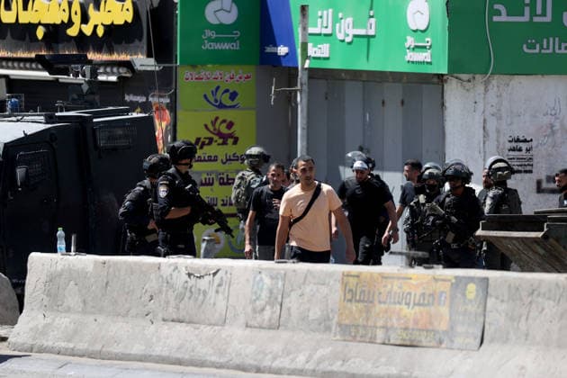 Israeli forces raid UNRWA s Kalendiya Education Center in East Jerusalem JERUSALEM - AUGUST 25 : Israeli forces raid the Qalandia Training Center belonging to the United Nations Relief and Works Agency for Palestine Refugees in the Near East (UNRWA) north of East Jerusalem on August 25, 2026. Israeli forces arrive to evacuate the center block surrounding streets and prevent local residents from approaching. Issam Rimawi Anadolu Jerusalem Palestinian Territory, Occupied. Editorial use only. Please get in touch for any other usage.  Copyright: x2026xAnadoluxIssamxRimawix