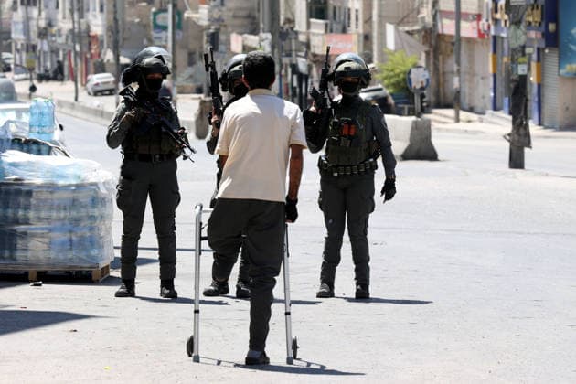 Israeli forces raid UNRWA s Kalendiya Education Center in East Jerusalem JERUSALEM - AUGUST 25 : Israeli forces raid the Qalandia Training Center belonging to the United Nations Relief and Works Agency for Palestine Refugees in the Near East (UNRWA) north of East Jerusalem on August 25, 2026. Israeli forces arrive to evacuate the center block surrounding streets and prevent local residents from approaching. Issam Rimawi Anadolu Jerusalem Palestinian Territory, Occupied. Editorial use only. Please get in touch for any other usage.  Copyright: x2026xAnadoluxIssamxRimawix