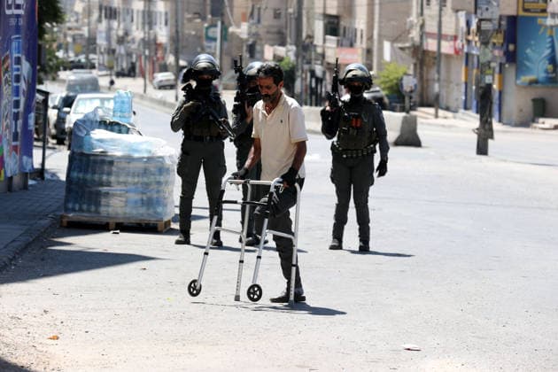 Israeli forces raid UNRWA s Kalendiya Education Center in East Jerusalem JERUSALEM - AUGUST 25 : Israeli forces raid the Qalandia Training Center belonging to the United Nations Relief and Works Agency for Palestine Refugees in the Near East (UNRWA) north of East Jerusalem on August 25, 2026. Israeli forces arrive to evacuate the center block surrounding streets and prevent local residents from approaching. Issam Rimawi Anadolu Jerusalem Palestinian Territory, Occupied. Editorial use only. Please get in touch for any other usage.  Copyright: x2026xAnadoluxIssamxRimawix