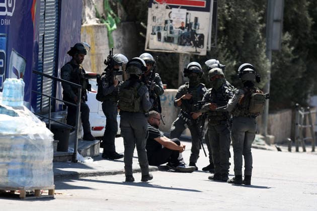 Israeli forces raid UNRWA s Kalendiya Education Center in East Jerusalem JERUSALEM - AUGUST 25 : Israeli forces raid the Qalandia Training Center belonging to the United Nations Relief and Works Agency for Palestine Refugees in the Near East (UNRWA) north of East Jerusalem on August 25, 2026. Israeli forces arrive to evacuate the center block surrounding streets and prevent local residents from approaching. Issam Rimawi Anadolu Jerusalem Palestinian Territory, Occupied. Editorial use only. Please get in touch for any other usage.  Copyright: x2026xAnadoluxIssamxRimawix