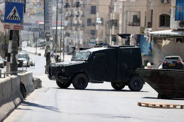 Israeli forces raid UNRWA s Kalendiya Education Center in East Jerusalem JERUSALEM - AUGUST 25 : Israeli forces raid the Qalandia Training Center belonging to the United Nations Relief and Works Agency for Palestine Refugees in the Near East (UNRWA) north of East Jerusalem on August 25, 2026. Israeli forces arrive to evacuate the center block surrounding streets and prevent local residents from approaching. Issam Rimawi Anadolu Jerusalem Palestinian Territory, Occupied. Editorial use only. Please get in touch for any other usage.  Copyright: x2026xAnadoluxIssamxRimawix